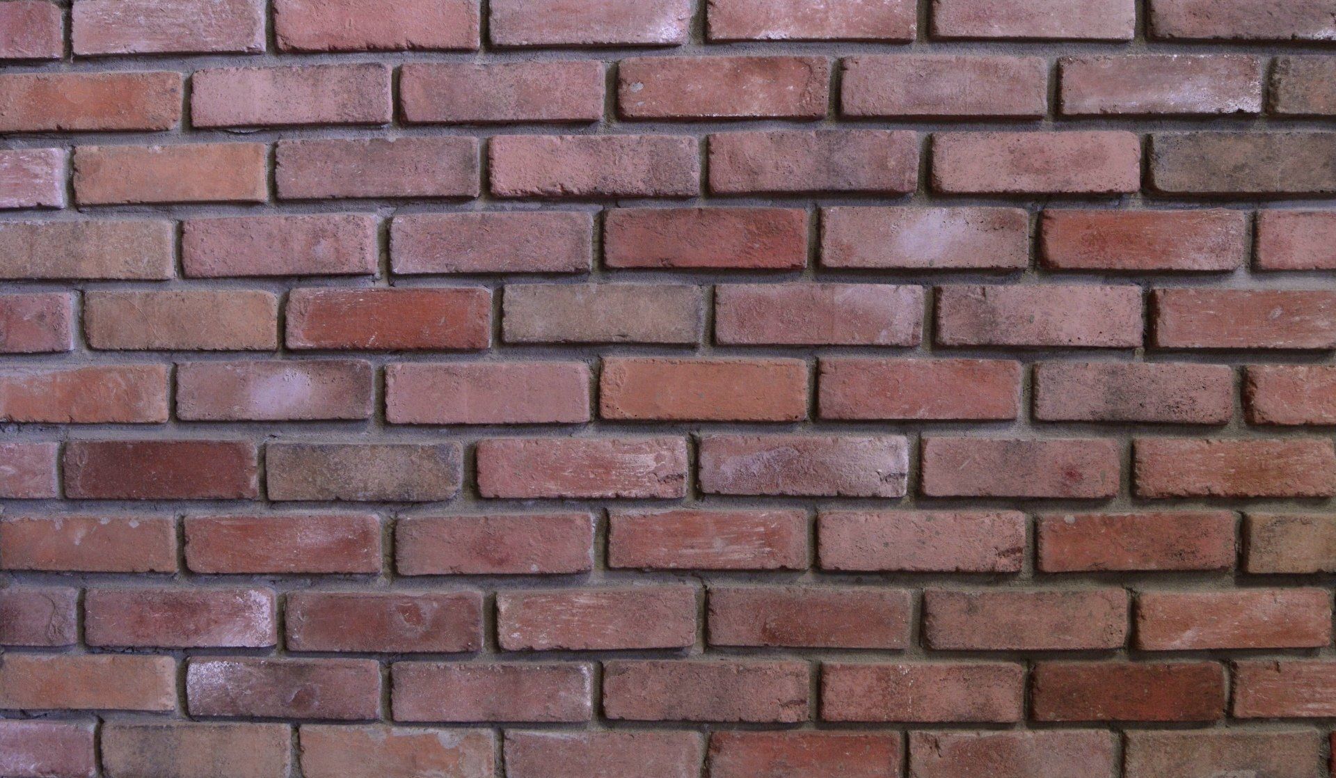 Brick manufactured stone veneer